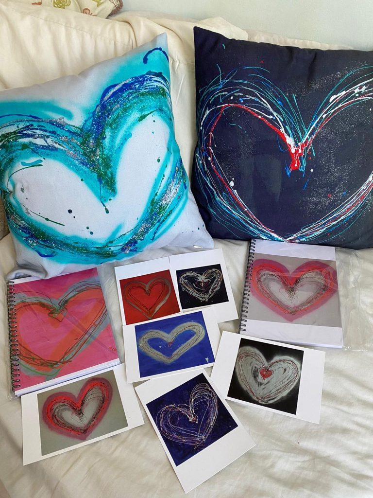 Heart paintings on cards and pillows